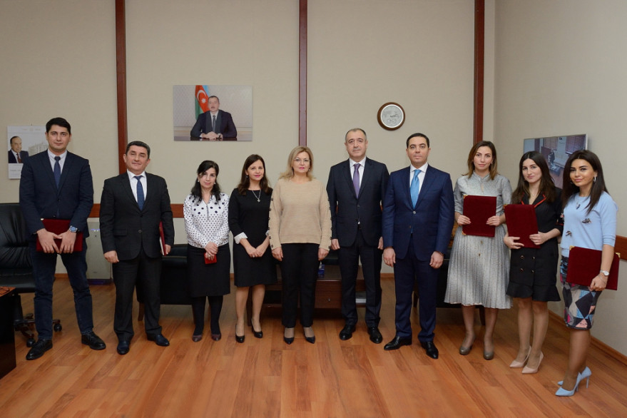 A group of communications workers awarded honorary titles and prizes